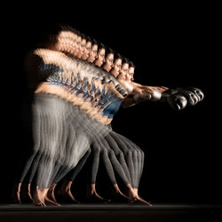 Boxer ilse lyan noor. motion study with stroboscopic light on black background