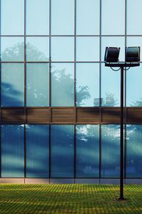 Reflection of building on glass window