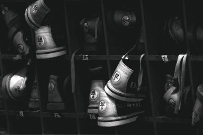 Close-up of bowling shoes on shelves