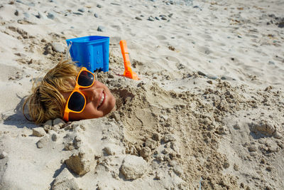 High angle view of hat on sand at beach