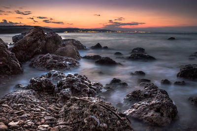 Scenic view of dramatic sky during sunset