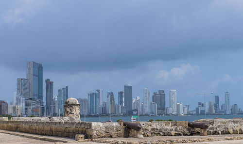Skyline of cartagena with the ancient city wall in the foreground