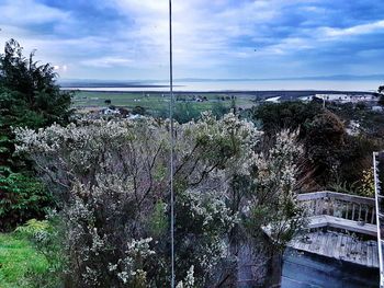 Scenic view of sea against cloudy sky