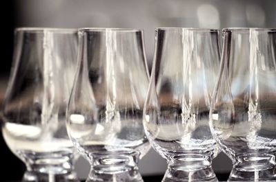Close-up of glasses on table