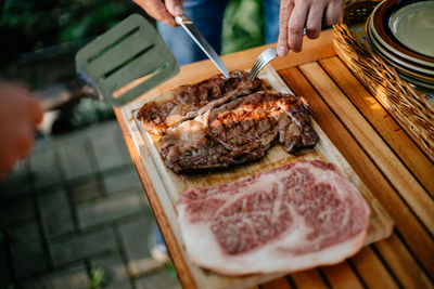 Close-up of meat on barbecue grill