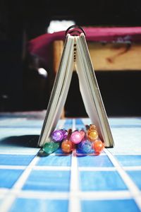 Close-up of multi colored balls on table