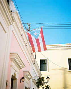 Low angle view of flag against sky