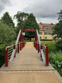 Wooden bridge against sky