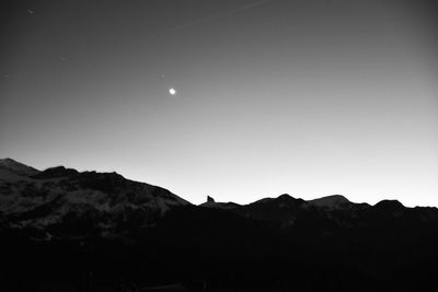Scenic view of mountains at night
