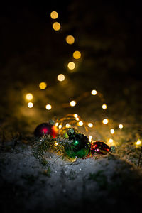 Close-up of illuminated christmas tree at night