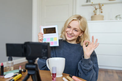 Young woman using mobile phone