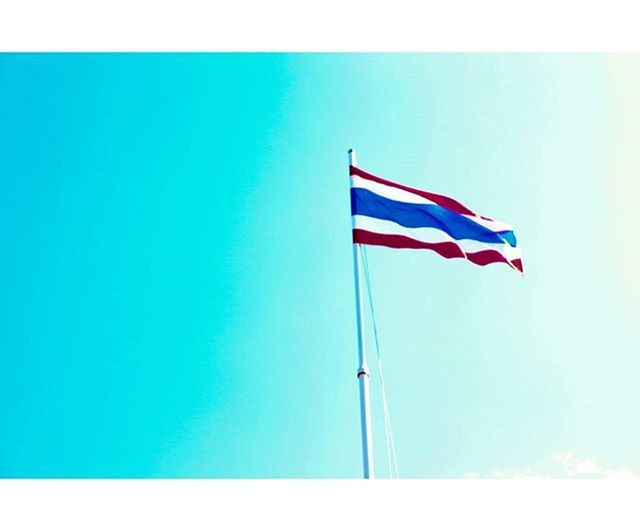 flag, patriotism, identity, national flag, low angle view, blue, american flag, wind, clear sky, culture, pole, sky, pride, striped, flag pole, red, transfer print, copy space, waving, day