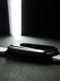 Close-up of smart watch on desk