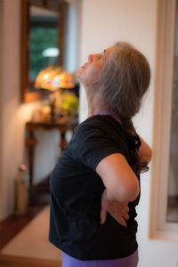 Woman at exercising at home