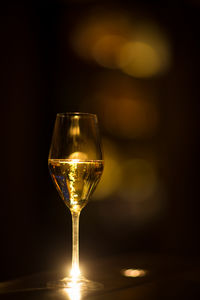 Close-up of champagne flute on table