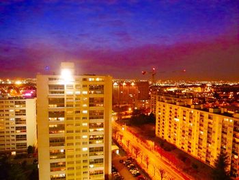 Illuminated cityscape at night