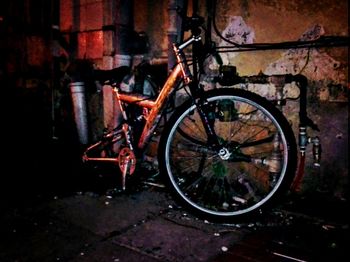 Abandoned bicycle at night