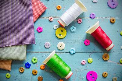 High angle view of multi colored buttons