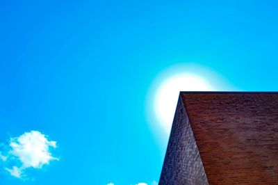 Low angle view of tower against clear blue sky