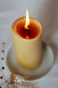 Close-up of candle on table