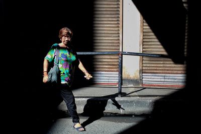 Full length of man walking with dog