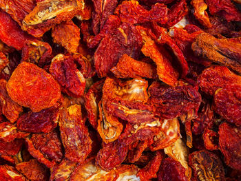 Full frame shot of dried tomatoes for sale at market stall