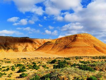 Scenic view of desert against sky