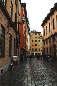 People walking on street in city