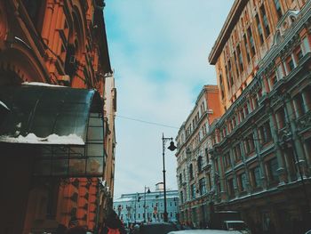 Street in city against sky