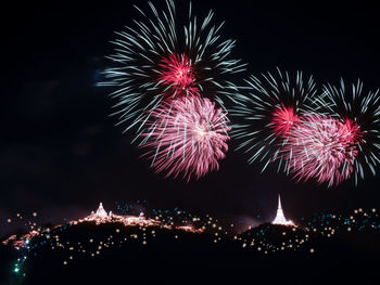 Firework display at night