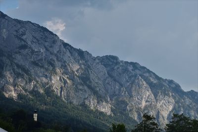 Low angle view of mountain range against sky