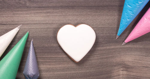 Directly above shot of heart shapes on table