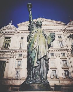 Low angle view of statue of building