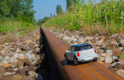 Toy car on railroad track