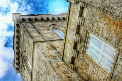 Built structure against cloudy sky