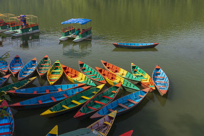 High angle view of boats moored in lake