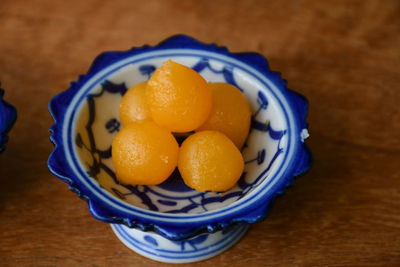 High angle view of fruits in bowl on table