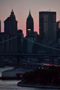 View of skyscrapers in city at night