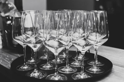 Close-up of wine glasses on table