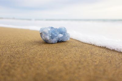 Close-up of stones on beach