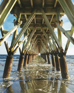 Below view of pier at beach