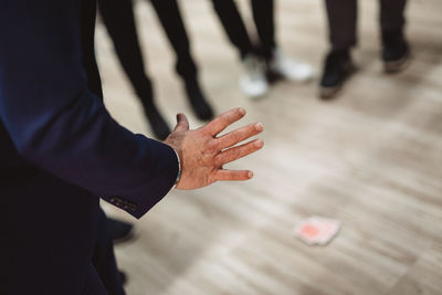 Low section of man and woman standing on floor