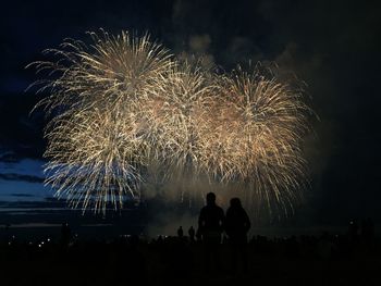 Firework display at night