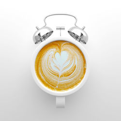 Directly above shot of coffee cup against white background