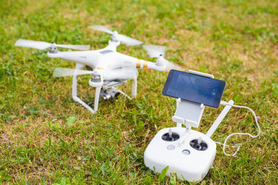 High angle view of toy airplane on field