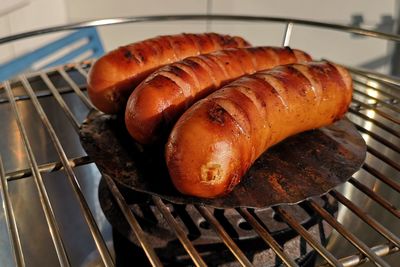 High angle view of meat on barbecue grill