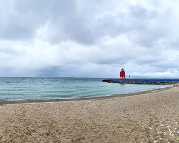 Scenic view of beach against sky