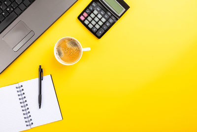 High angle view of coffee cup on table