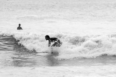 Man surfing in sea