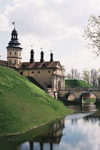 Bridge over river against sky